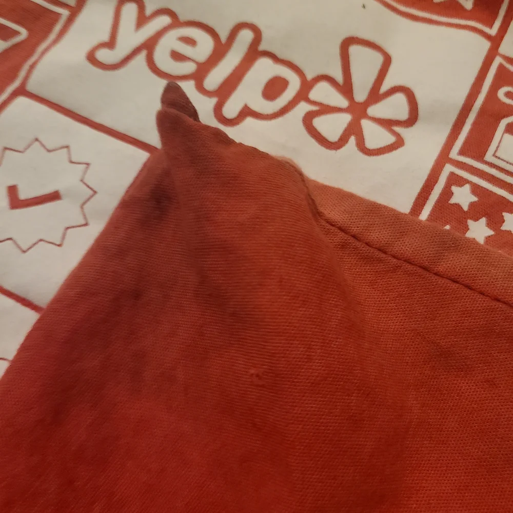 Elite 2014 White Beach Towel with Red and Yellow Icons